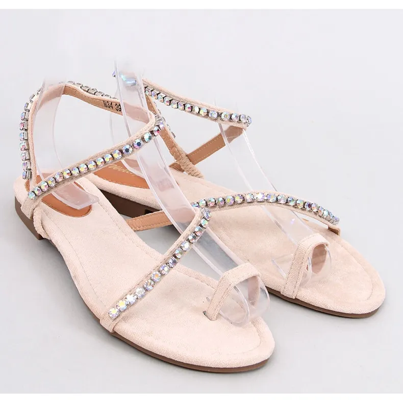 Ayless Beige flip-flop sandals with rhinestones