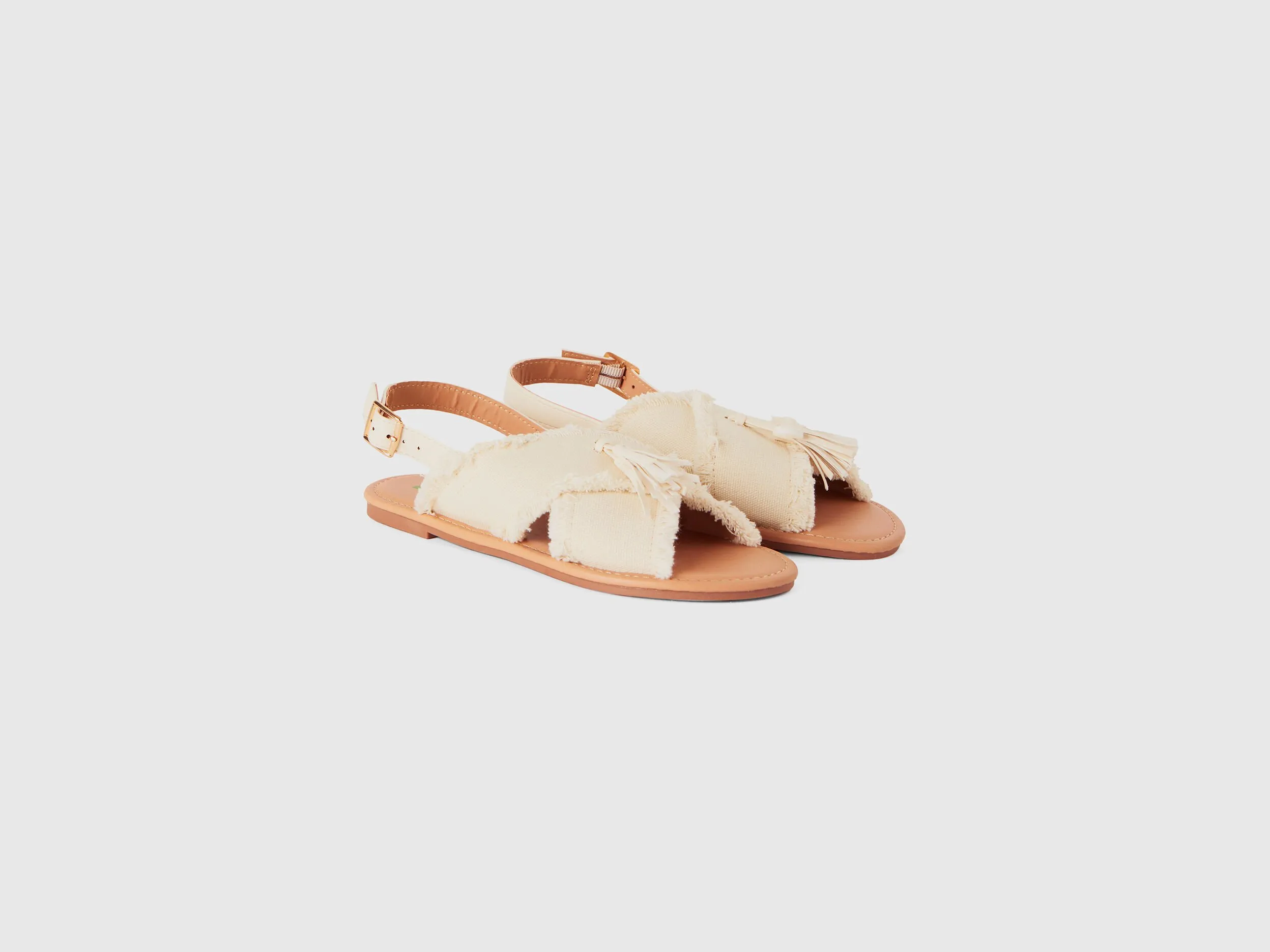 Flat sandals with tassels - Creamy White | Benetton