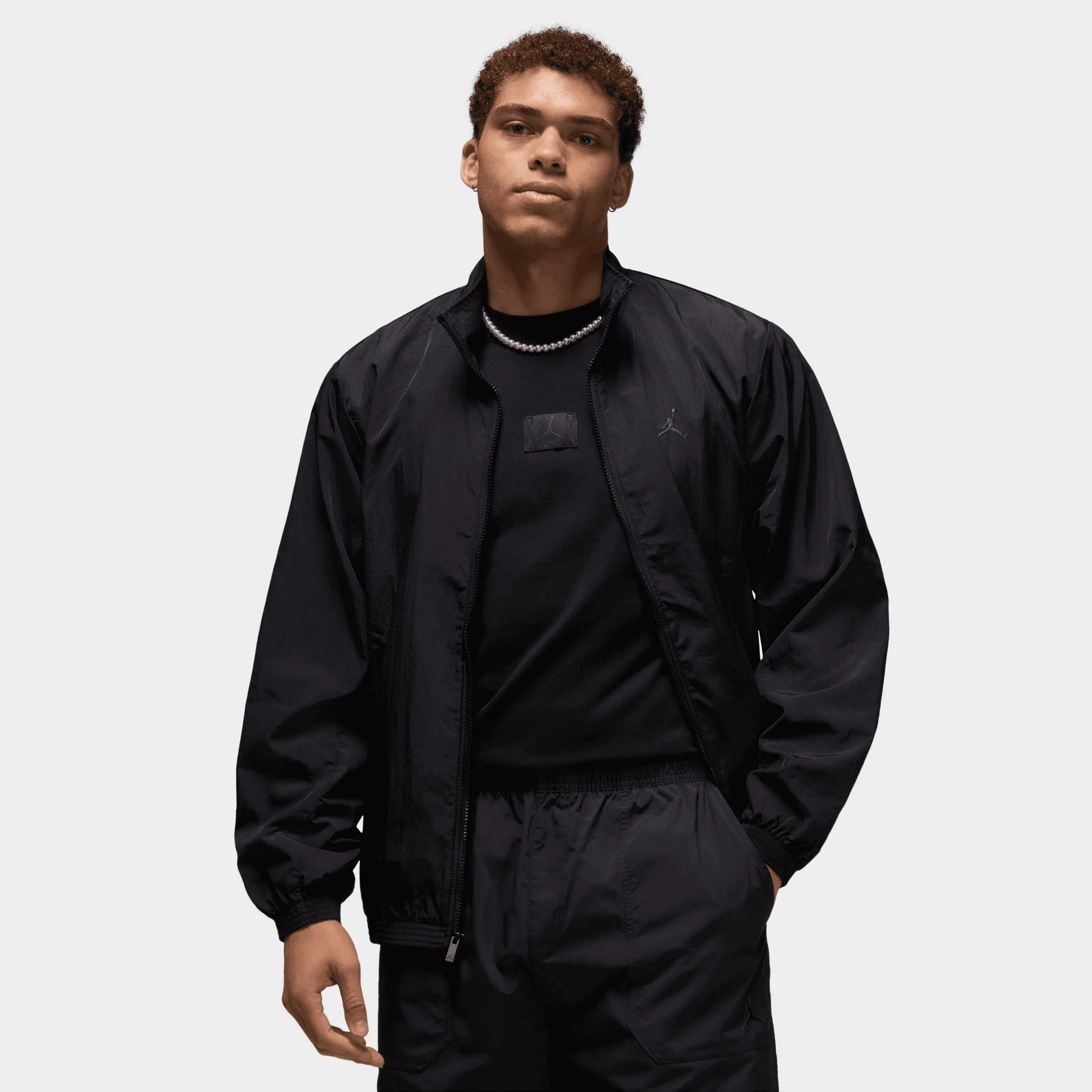 Jordan Essentials Wind Track Jacket / Black