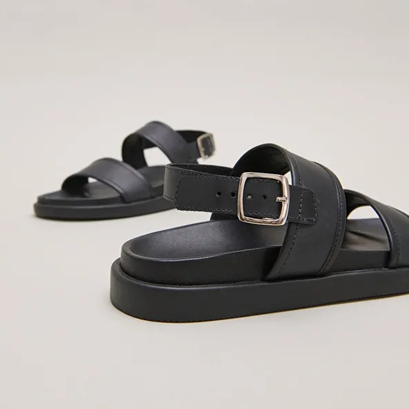 Sandals with double straps in black leather