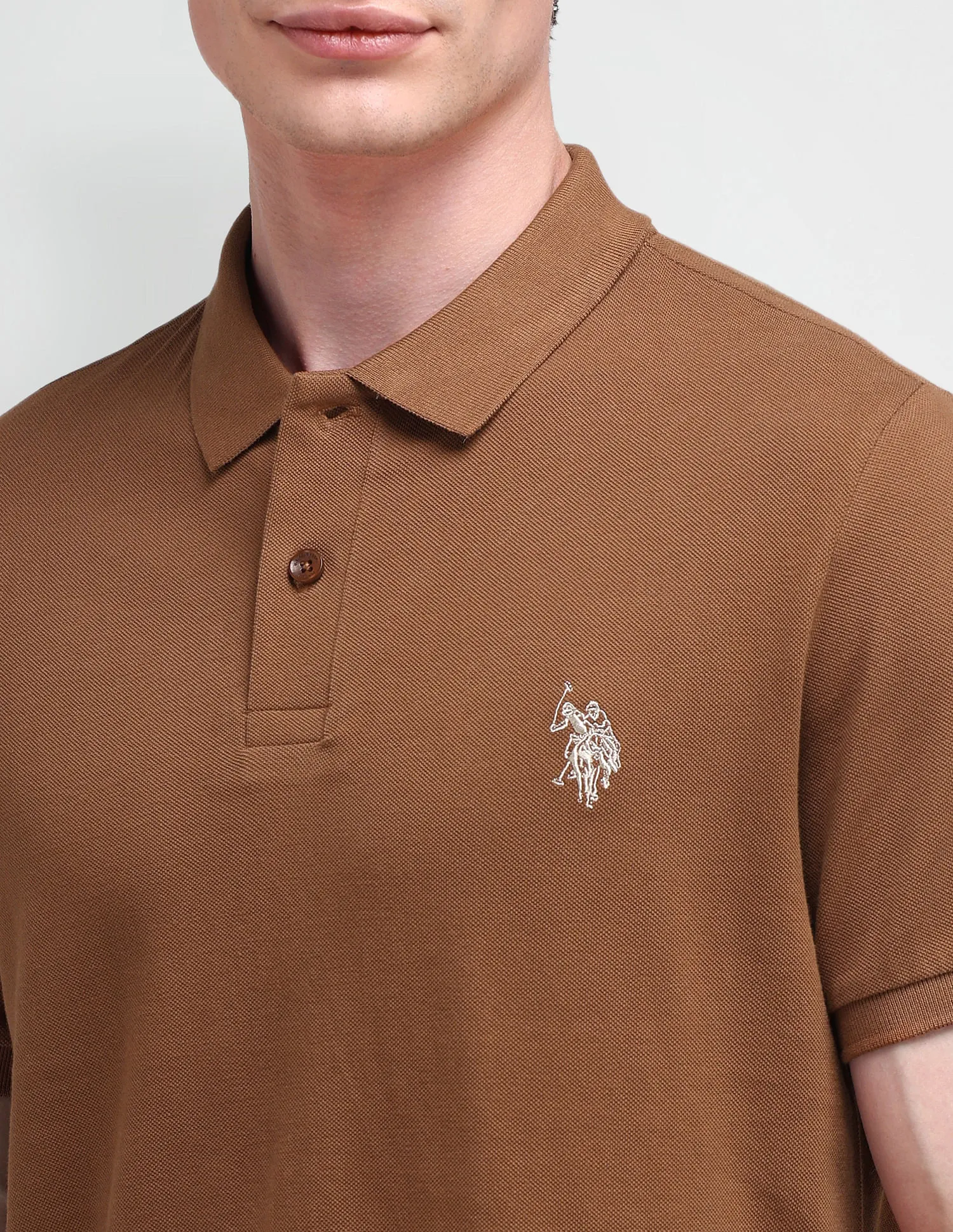 U.S. Polo Assn. Denim Co. Muscle Fit Solid Polo Shirt