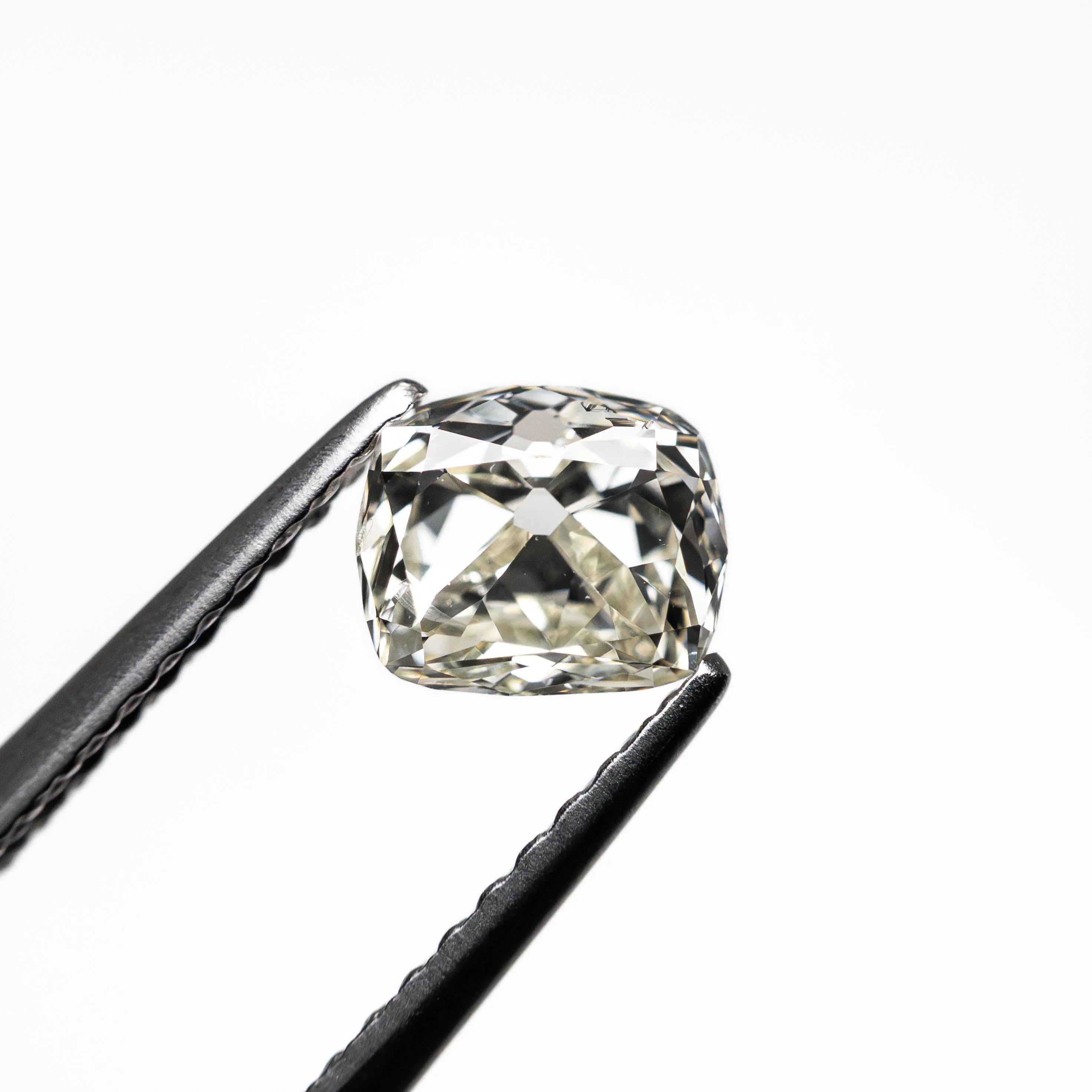 White Modern Antique Old Mine Cut Diamond - 0.66ct Cushion